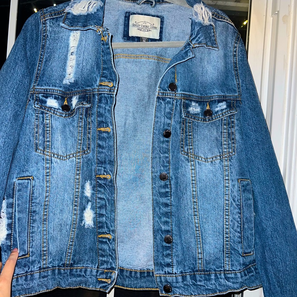 Distressed denim jacket